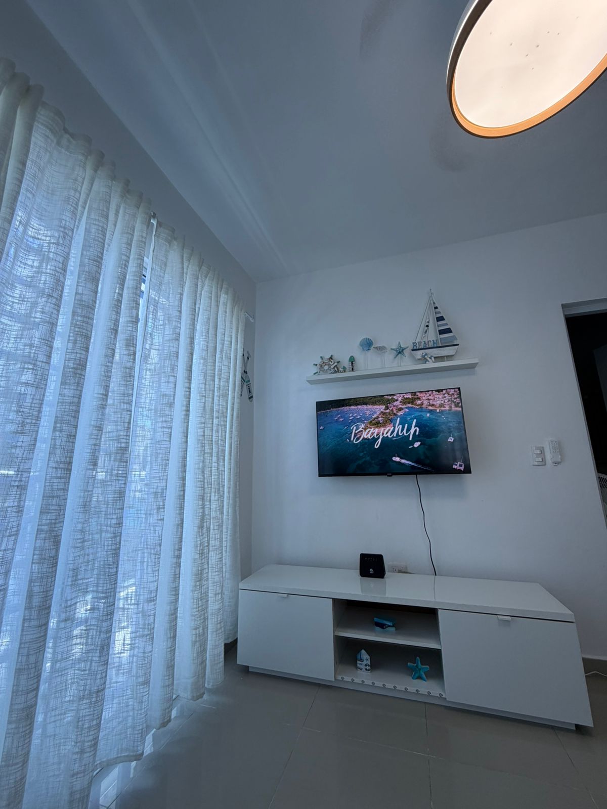 Bedroom with shell-themed bedding